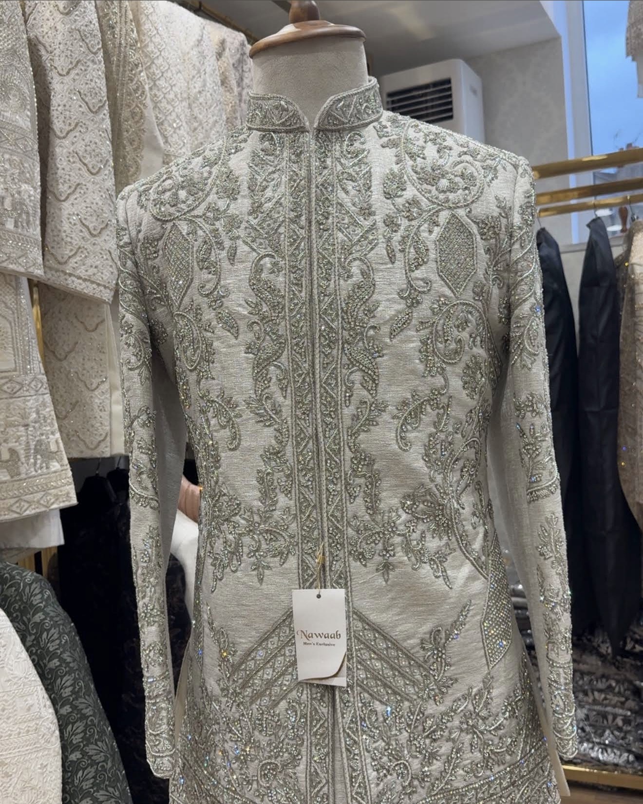 Hand-embroidered ivory sherwani at Nawaab Men's Exclusive